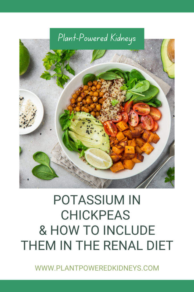 Bowl of chickpeas, rice, quinoa, sliced avocado, spinach, halved grape tomatoes, and diced sweet potato. On the table are spinach leaves and parsley, with a small bowl of sesame seeds.